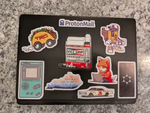 Finally got around to sticker bombing my latest linux laptop